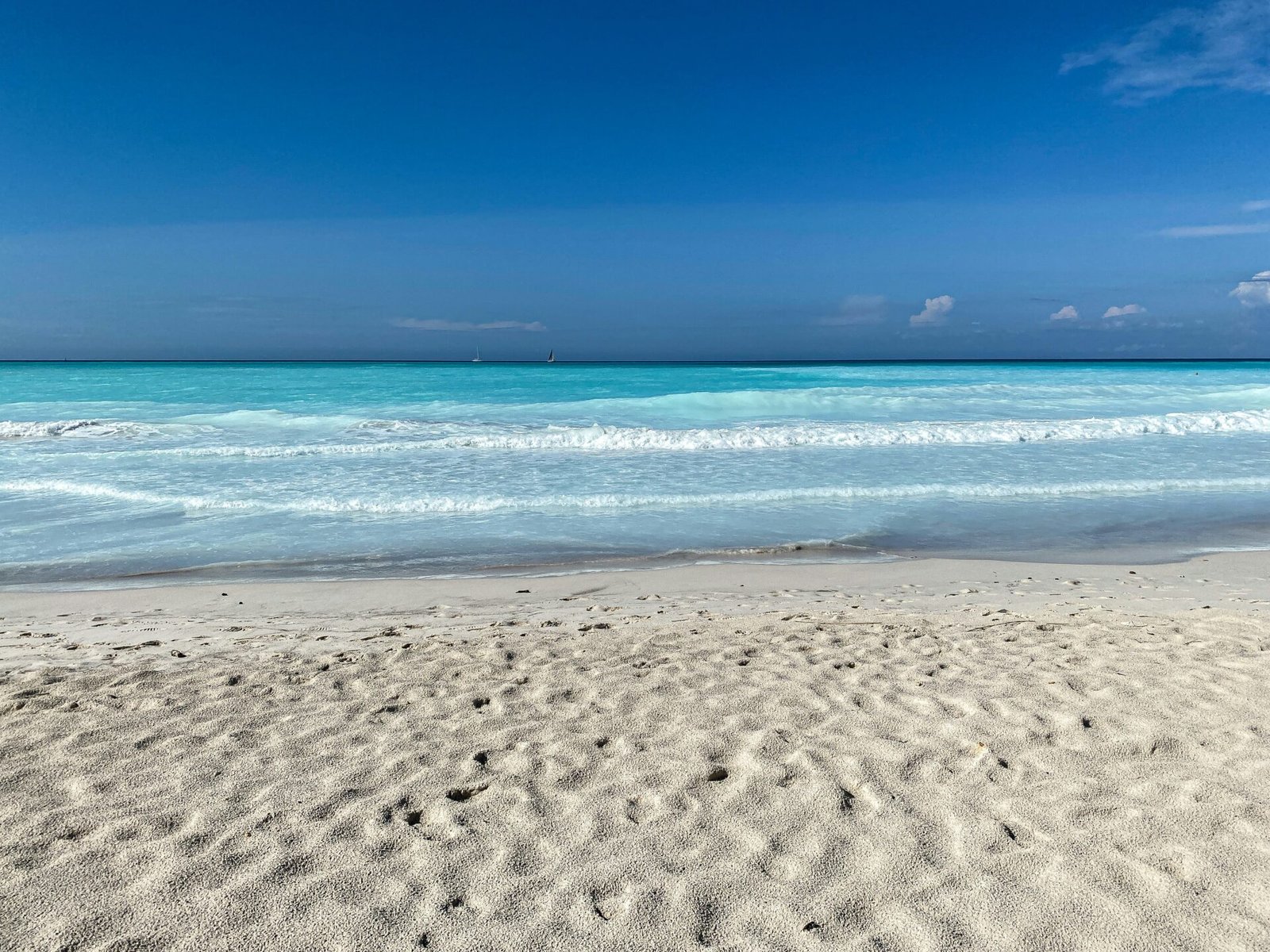 blue sea under blue sky during daytime